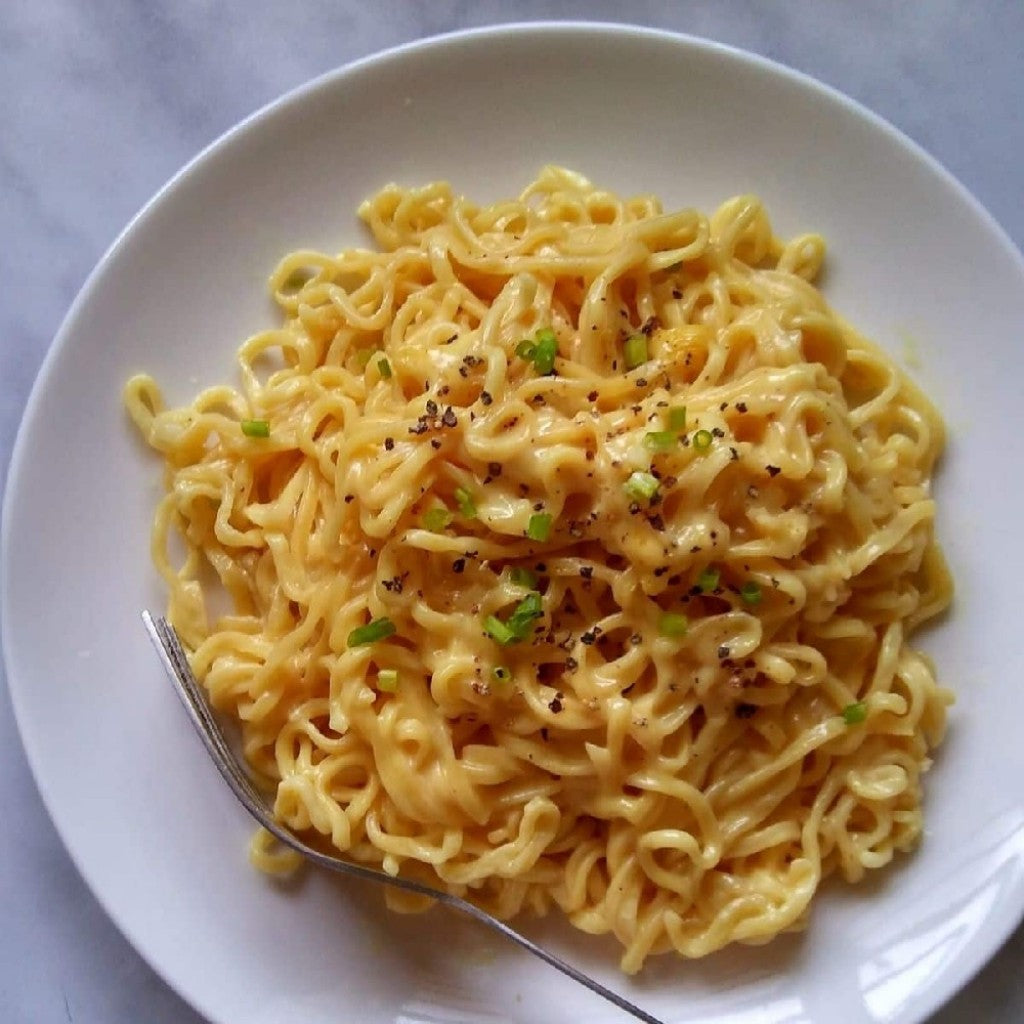 Macarrão Instantâneo Sabor Queijo e TTeokbokki Bolinho de Arroz Apimentado 122g Bibigo